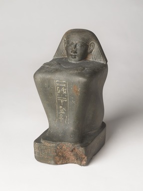  <em>Overseer of Weavers, Min</em>, ca. 1479–1425 B.C.E. Green siltstone or greywacke, 9 1/4 × 4 1/2 × 6 in., 14 lb. (23.5 × 11.4 × 15.2 cm, 6.35kg). Brooklyn Museum, Charles Edwin Wilbour Fund, 37.249E. Creative Commons-BY (Photo: , 37.249E_PS9.jpg)