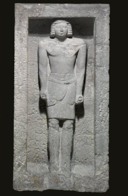  <em>Statue in a Niche</em>, ca. 2600-2345 B.C.E. Limestone, 45 1/4 x 22 1/8 x 8 in. (114.9 x 56.2 x 20.3 cm). Brooklyn Museum, Charles Edwin Wilbour Fund, 37.24E. Creative Commons-BY (Photo: Brooklyn Museum, 37.24E_PS1.jpg)