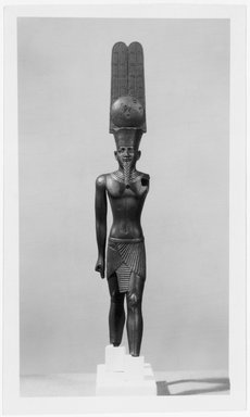  <em>Amun-Re in a Crown with Tall Plumes</em>, ca. 760-656 B.C.E. Bronze, gold, 7 15/16 x 1 1/2 x 1 7/16 in. (20.2 x 3.8 x 3.7 cm). Brooklyn Museum, Charles Edwin Wilbour Fund, 37.254E. Creative Commons-BY (Photo: Brooklyn Museum, 37.254E_print_bw_SL1.jpg)