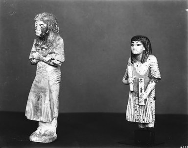  <em>Statue of Hori Represented as a Scribe</em>, ca. 1295-1185 B.C.E. Faience, 5 1/4 x 2 5/8 x 1 3/16 in. (13.3 x 6.6 x 3 cm). Brooklyn Museum, Charles Edwin Wilbour Fund, 37.257E. Creative Commons-BY (Photo: Brooklyn Museum, 37.257E_37.148E_GRPA_glass_bw_SL4.jpg)