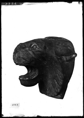 <em>Lion Head from a Chair or Throne</em>, 525-404 B.C.E. Wood, glass, 5 x 4 5/8 x 4 11/16 in. (12.7 x 11.8 x 11.9 cm). Brooklyn Museum, Charles Edwin Wilbour Fund, 37.261E. Creative Commons-BY (Photo: Brooklyn Museum, 37.261E_SL4.jpg)