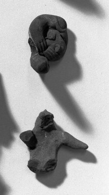  <em>Figurine</em>. Reddish brown clay Brooklyn Museum, Frank Sherman Benson Fund and the Henry L. Batterman Fund, 37.3020PA. Creative Commons-BY (Photo: Brooklyn Museum, 37.3020PA_acetate_bw.jpg)