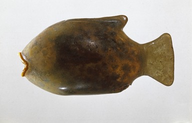  <em>Core-Formed Fish Flask</em>, ca. 1390–1292 B.C.E. Glass, 2 1/4 × 4 3/8 × 1 5/8 in. (5.7 × 11.1 × 4.1 cm). Brooklyn Museum, Charles Edwin Wilbour Fund, 37.316E. Creative Commons-BY (Photo: Brooklyn Museum, 37.316E_SL1.jpg)