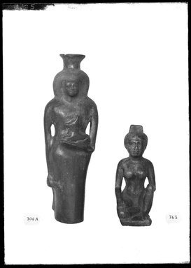  <em>Seated Female Figurine</em>, ca. 838-332 B.C.E. Wood, Height: 4 7/16 in. (11.3 cm). Brooklyn Museum, Charles Edwin Wilbour Fund, 37.1527E. Creative Commons-BY (Photo: , 37.331E_37.1527E_GrpA_SL4.jpg)