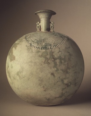  <em>Pilgrim Flask</em>, 664-332 B.C.E. Faience, 6 11/16 × Diam. 5 13/16 in. (17 × 14.8 cm). Brooklyn Museum, Charles Edwin Wilbour Fund, 37.337E. Creative Commons-BY (Photo: Brooklyn Museum, 37.337E.jpg)
