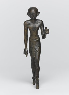  <em>Striding Figure of a Priest</em>, ca. 1070-656 B.C.E. Bronze, 4 13/16 x 1 5/16 x 1 3/4 in. (12.3 x 3.4 x 4.4 cm). Brooklyn Museum, Charles Edwin Wilbour Fund, 37.363E. Creative Commons-BY (Photo: Brooklyn Museum, 37.363E_front_PS1.jpg)