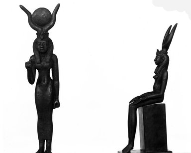  <em>Statuette of Isis</em>. Bronze, 6 7/8 × 1 7/16 × 1 3/4 in. (17.5 × 3.7 × 4.5 cm). Brooklyn Museum, Charles Edwin Wilbour Fund, 37.370E. Creative Commons-BY (Photo: , 37.370E_37.566E_NegA_glass_bw_SL4.jpg)