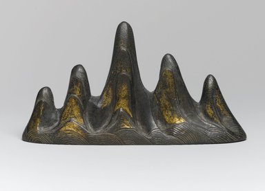  <em>Brush Rest in the Form of a Mountain</em>, 18th century (possibly). Bronze, traces of gilding, 3 7/8 x 1 11/16 x 7 1/16 in. (9.8 x 4.3 x 17.9 cm). Brooklyn Museum, Frank L. Babbott Fund, 37.371.13. Creative Commons-BY (Photo: Brooklyn Museum, 37.371.13_PS1.jpg)