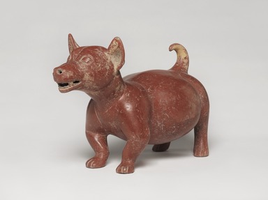 Colima. <em>Dog Figure</em>, 200 B.C.E.-300 C.E. Ceramic, 11 1/4 × 8 1/2 × 16 3/4 in. (28.6 × 21.6 × 42.5 cm). Brooklyn Museum, A. Augustus Healy Fund, 37.390. Creative Commons-BY (Photo: Brooklyn Museum, 37.390_threequarter_left_PS9.jpg)