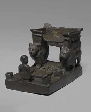  <em>Throne with Lions and Worshipper</em>, 664–332 B.C.E. Bronze, 3 1/16 x 3 7/8 x 2 9/16 in. (7.8 x 9.8 x 6.5 cm). Brooklyn Museum, Charles Edwin Wilbour Fund, 37.418E. Creative Commons-BY (Photo: Brooklyn Museum, 37.418E_threequarter_PS9.jpg)