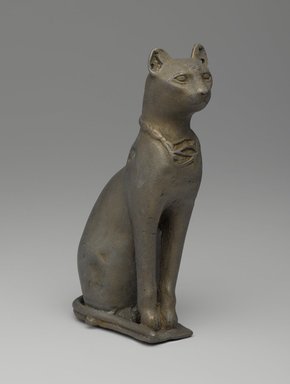  <em>Statuette of a Cat</em>, 332–30 B.C.E. Bronze, 5 9/16 x 2 1/16 x 3 1/8 in. (14.2 x 5.2 x 8 cm). Brooklyn Museum, Charles Edwin Wilbour Fund, 37.427E. Creative Commons-BY (Photo: Brooklyn Museum, 37.427E_PS9.jpg)