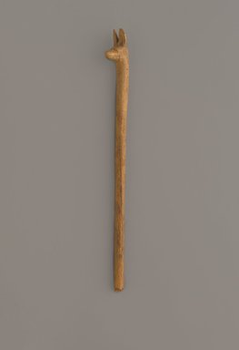  <em>Jackal-Headed Peg from a Board Game</em>, ca. 2008-1075 B.C.E. Wood, 13/16 x 1/2 x 7 1/2 in. (2.1 x 1.3 x 19 cm). Brooklyn Museum, Charles Edwin Wilbour Fund, 37.462E. Creative Commons-BY (Photo: Brooklyn Museum, 37.462E_side2_PS9.jpg)
