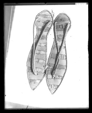  <em>Pair of Sandals</em>. Reed, 1/2 × 6 15/16 in. (1.3 × 17.7 cm). Brooklyn Museum, Charles Edwin Wilbour Fund, 37.469Ea-b. Creative Commons-BY (Photo: Brooklyn Museum, 37.469Ea-b_NegA_SL4.jpg)