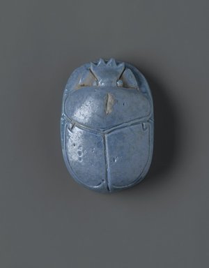  <em>"Marriage Scarab" of Amunhotep III and Queen Tiye</em>, ca. 1390-1353 B.C.E. Faience, 1 1/8 x 1 15/16 x 2 3/4 in. (2.8 x 5 x 7 cm). Brooklyn Museum, Charles Edwin Wilbour Fund, 37.475E. Creative Commons-BY (Photo: Brooklyn Museum, 37.475E_top_PS2.jpg)