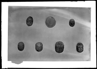  <em>Scarab Seal Bearing the Name of Thutmose III</em>, ca. 1479-1425 B.C.E., or later. Steatite, glaze, 3/8 x 1/2 x 3/4 in. (0.9 x 1.3 x 1.9 cm). Brooklyn Museum, Charles Edwin Wilbour Fund, 37.520E. Creative Commons-BY (Photo: , 37.493E_37.497E_37.510E_37.517E_37.520E_37.868E_37.1166E_GrpA_SL4.jpg)