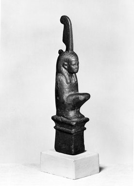  <em>Statuette of the Goddess Maat Seated on a Shrine</em>, ca. 664–332 B.C.E. Bronze, 3 7/8 x 1/2 x 1 1/16 in. (9.9 x 1.2 x 2.7 cm). Brooklyn Museum, Charles Edwin Wilbour Fund, 37.561E. Creative Commons-BY (Photo: Brooklyn Museum, 37.561E_NegA_print_SL4.jpg)