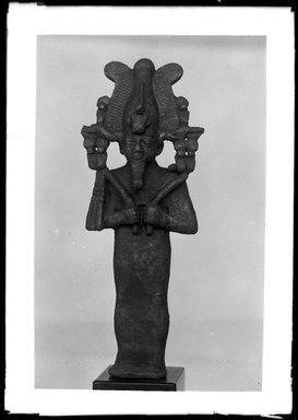  <em>Statuette of Osiris Wearing an Elaborate Crown</em>, 664-332 B.C.E. Bronze, without tang: 5 5/16 x 1 7/8 x 1 1/8 in. (13.5 x 4.8 x 2.8 cm). Brooklyn Museum, Charles Edwin Wilbour Fund, 37.564E. Creative Commons-BY (Photo: Brooklyn Museum, 37.564E_NegA_SL4.jpg)