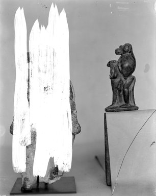  <em>Amulet of Standing Ape Preceded by Sekhmet</em>. Serpentine, 2 9/16 x 7/8 x 1 1/4 in. (6.5 x 2.3 x 3.2 cm). Brooklyn Museum, Charles Edwin Wilbour Fund, 37.592E. Creative Commons-BY (Photo: Brooklyn Museum, 37.592E_NegE_glass_bw_SL4.jpg)