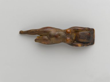  <em>Toilet Dish Held by a Figure of a Woman Floating</em>, ca. 1539-1292 B.C.E. Ivory, 1 1/4 x 5 3/8 in. (3.1 x 13.7 cm). Brooklyn Museum, Charles Edwin Wilbour Fund, 37.611E. Creative Commons-BY (Photo: Brooklyn Museum, 37.611E_front_PS1.jpg)