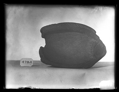 Egyptian. <em>Dish in the Form of a Fish</em>, ca. 760-525 B.C. Stone, 2 3/4 x 5/8 x 3 15/16 in. (7 x 1.6 x 10 cm)fish is 6.9 cm. x 9.9 cm.; h. of vessel 1.7 cm. Brooklyn Museum, Charles Edwin Wilbour Fund, 37.628E. Creative Commons-BY (Photo: Brooklyn Museum, 37.628E_NegA_SL4.jpg)