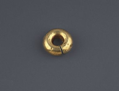  <em>Hoop</em>, ca. 1539–1190 B.C.E. Gold, 1/4 x  Diam. 13/16 in. (0.7 x 2 cm). Brooklyn Museum, Charles Edwin Wilbour Fund, 37.744E. Creative Commons-BY (Photo: Brooklyn Museum, 37.744E_SL1.jpg)