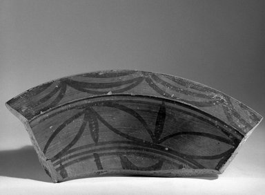 Indus Valley Culture. <em>Fragment of Broad Shallow Vessel</em>, ca. 2500 B.C.E. Red pottery with red and black slip-painted decoration, 11.2 x 29 cm (11.2 x 29 cm). Brooklyn Museum, A. Augustus Healy Fund, 37.75. Creative Commons-BY (Photo: Brooklyn Museum, 37.75_bw.jpg)