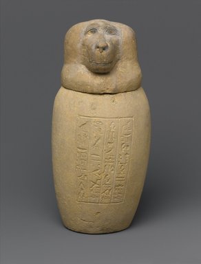  <em>Canopic Jar and Lid (Depicting a Baboon)</em>, 664–404 B.C.E. Limestone, 9 3/4 x Diam. 4 3/4 in. (24.8 x 12.1 cm). Brooklyn Museum, Charles Edwin Wilbour Fund, 37.897Ea-b. Creative Commons-BY (Photo: Brooklyn Museum, 37.897Ea-b_front_PS1.jpg)