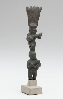  <em>Bes with Lute</em>, 664–343 B.C.E. Copper alloy, 4 1/2 × 1 1/16 × 7/8 in. (11.4 × 2.7 × 2.3 cm). Brooklyn Museum, Charles Edwin Wilbour Fund, 37.921E. Creative Commons-BY (Photo: Brooklyn Museum, 37.921E_front_PS2.jpg)