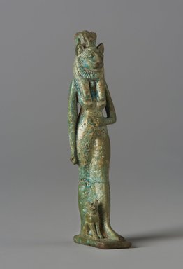  <em>Amulet of a Lion-Headed Goddess with Cat</em>, ca. 1075–30 B.C.E. Faience, 3 1/4 x 3/4 x 1 in. (8.2 x 2 x 2.5 cm). Brooklyn Museum, Charles Edwin Wilbour Fund, 37.977E. Creative Commons-BY (Photo: Brooklyn Museum, 37.977E_PS11.jpg)