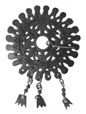  <em>Woman's Brooch</em>. Cast silver with an admixture of copper and iron, 3 1/4". Brooklyn Museum, Gift of Mr. and Mrs. George W. Davison, 38.105. Creative Commons-BY (Photo: Brooklyn Museum, 38.105_bw.jpg)