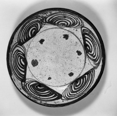  <em>Horse-Eye Dish</em>, early 19th century. Glazed stoneware with iron decoration; Seto ware, 2 1/16 x 10 3/16 in. (5.2 x 25.9 cm). Brooklyn Museum, By exchange, 38.149. Creative Commons-BY (Photo: Brooklyn Museum, 38.149_acetate_bw.jpg)