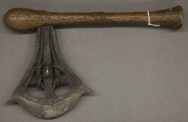Songye. <em>Axe</em>, late 19th or early 20th century. Wrought iron, copper, wood, 14 3/8 x 9 x 1 1/2 in. (36.5 x 22.8 x 3.7 cm). Brooklyn Museum, Gift of Newton Stevenson, 38.242. Creative Commons-BY (Photo: Brooklyn Museum, 38.242_PS10.jpg)