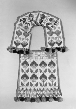 Hochunk. <em>Bandolier Bag</em>, early 20th century. Beads, cloth, wool, silk, and metal bells, 39 3/8 × 19 in. (100 × 48.3 cm). Brooklyn Museum, Dick S. Ramsay Fund, 38.632. Creative Commons-BY (Photo: Brooklyn Museum, 38.632_acetate_bw.jpg)