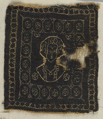 Coptic. <em>Bust of a Female</em>, 5th-6th century C.E. Flax, wool, 4 1/2 x 4 in. (11.4 x 10.2 cm). Brooklyn Museum, Charles Edwin Wilbour Fund, 38.674. Creative Commons-BY (Photo: Brooklyn Museum, 38.674_PS9.jpg)