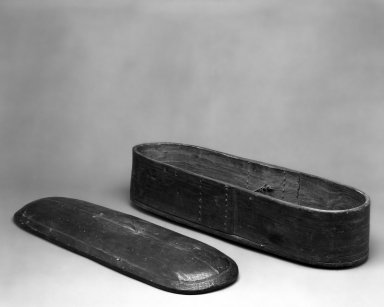 Native Alaskan. <em>Eliptical Tool Box with Cover</em>, 19th or early 20th century. Wood, hide, a: 23 x 7 1/4 x 4 7/8 in. or (60.0 x 17.2 cm). Brooklyn Museum, Gift of Frank K. Fairchild, 38.694a-b. Creative Commons-BY (Photo: Brooklyn Museum, 38.694a-b_bw.jpg)