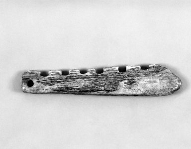Native Alaskan. <em>Sled Runner Section</em>, probably 19th century. Ivory, 10 x 2 x 3/4 in. or (25.5 x 5.5 cm). Brooklyn Museum, Gift of Frank K. Fairchild, 38.698. Creative Commons-BY (Photo: Brooklyn Museum, 38.698_bw.jpg)