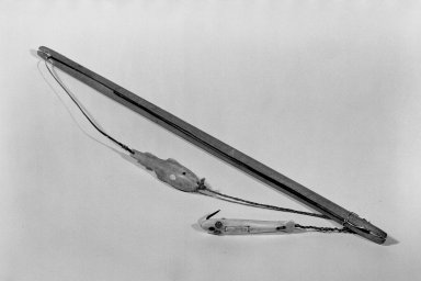 Native Alaskan. <em>Fish Hook and Sinker shaped like a fish and attached to a stick</em>, 1900-1930. Ivory, iron, wood, glass beads, 20 1/4 x 11/16in. (51.5 x 1.7cm). Brooklyn Museum, Gift of Frank K. Fairchild, 38.712a-c. Creative Commons-BY (Photo: Brooklyn Museum, 38.712a-c_acetate_bw.jpg)