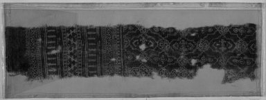  <em>Egypto-Arabic Textile, Fragment of Hanging? found in Egypt</em>, 16th–17th century. Textile, 20 1/16 x 4 5/16 in. (51 x 11 cm). Brooklyn Museum, Charles Edwin Wilbour Fund, 38.840. Creative Commons-BY (Photo: Brooklyn Museum, 38.840_acetate_bw.jpg)