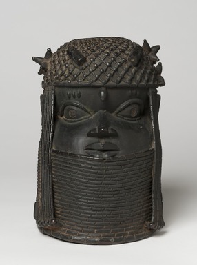 Edo. <em>Commemorative Head of an Ọba (Uhunmwu Elao)</em>, 18th century. Copper alloy, iron, 11 1/4 × 7 7/8 in. (28.5 × 20 cm). Brooklyn Museum, Alfred W. Jenkins Fund, 39.111. Creative Commons-BY (Photo: Brooklyn Museum, 39.111_overall_PS11.jpg)