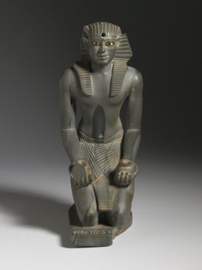  <em>Kneeling Statuette of Pepy I</em>, ca. 2338–2298 B.C.E. Greywacke, Egyptian alabaster (calcite), obsidian, copper, 6 x 1 13/16 x 3 9/16 in. (15.2 x 4.6 x 9 cm). Brooklyn Museum, Charles Edwin Wilbour Fund, 39.121. Creative Commons-BY (Photo: Brooklyn Museum, 39.121_front_PS6.jpg)