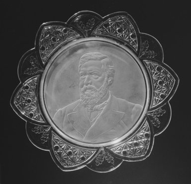  <em>Plate (James Blaine)</em>, ca. 1884. Glass, 1 1/4 x 11 3/8 x 11 3/8 in. (3.2 x 28.9 x 28.9 cm). Brooklyn Museum, Gift of Mrs. William Greig Walker by subscription, 40.160. Creative Commons-BY (Photo: Brooklyn Museum, 40.160_bw.jpg)