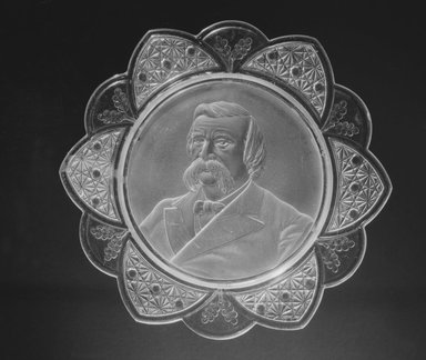  <em>Plate (John Logan)</em>, ca. 1884. Glass, 1 1/8 x 11 3/8 x 11 3/8 in. (2.9 x 28.9 x 28.9 cm). Brooklyn Museum, Gift of Mrs. William Greig Walker by subscription, 40.162. Creative Commons-BY (Photo: Brooklyn Museum, 40.162_bw.jpg)