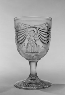  <em>Tumbler (Abraham Lincoln)</em>, ca. 1865-1866. Glass, 6 x 3 1/2 x 3 1/2 in. (15.2 x 8.9 x 8.9 cm). Brooklyn Museum, Gift of Mrs. William Greig Walker by subscription, 40.180. Creative Commons-BY (Photo: Brooklyn Museum, 40.180_bw.jpg)