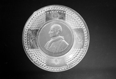  <em>Plate (Pope Leo XIII)</em>, ca. 1893. Glass, 1 1/4 x 9 7/8 x 9 7/8 in. (3.2 x 25.1 x 25.1 cm). Brooklyn Museum, Gift of Mrs. William Greig Walker by subscription, 40.192. Creative Commons-BY (Photo: Brooklyn Museum, 40.192_bw.jpg)