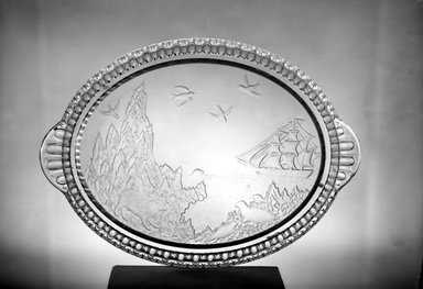 Crystal Glass Company (Bridgeport, Ohio). <em>Platter (Alaskan scene)</em>, 1867. Glass, 1 1/4 x 15 1/2 x 11 1/8 in. (3.2 x 39.4 x 28.3 cm). Brooklyn Museum, Gift of Mrs. William Greig Walker by subscription, 40.208. Creative Commons-BY (Photo: Brooklyn Museum, 40.208_acetate_bw.jpg)