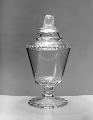 American. <em>Sugar Bowl and Cover</em>, 1858. Glass, 8 5/8 x 4 1/2 x 4 1/2 in. (21.9 x 11.4 x 11.4 cm). Brooklyn Museum, Gift of Mrs. William Greig Walker by subscription, 40.227a-b. Creative Commons-BY (Photo: Brooklyn Museum, 40.227a-b_bw.jpg)