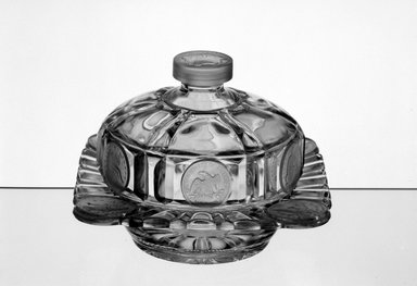 American. <em>Butter Dish and Lid</em>, 1892. Glass, 4 5/8 x 6 1/2 x 6 1/2 in. (11.7 x 16.5 x 16.5 cm). Brooklyn Museum, Gift of Mrs. William Greig Walker by subscription, 40.235a-b. Creative Commons-BY (Photo: Brooklyn Museum, 40.235_acetate_bw.jpg)