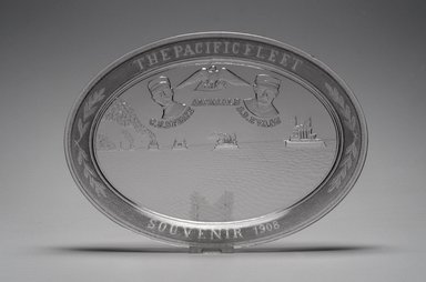 American. <em>Platter (Pacific Fleet with Admirals Charles Sperry and Robley Evans)</em>, 1908. Glass, 1 x 11 1/4 x 8 1/8 in. (2.5 x 28.6 x 20.6 cm). Brooklyn Museum, Gift of Mrs. William Greig Walker by subscription, 40.236. Creative Commons-BY (Photo: Brooklyn Museum, 40.236.jpg)