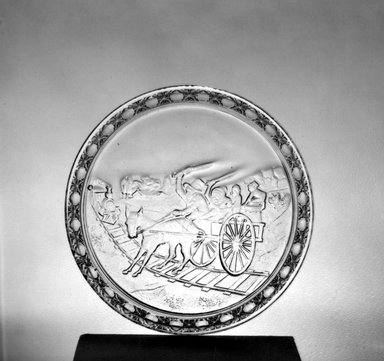 American. <em>Plate (Railroad Crossing scene)</em>, late 19th century. Glass, 3/4 x 9 1/2 x 9 1/2 in. (1.9 x 24.1 x 24.1 cm). Brooklyn Museum, Gift of Mrs. William Greig Walker by subscription, 40.239. Creative Commons-BY (Photo: Brooklyn Museum, 40.239_acetate_bw.jpg)