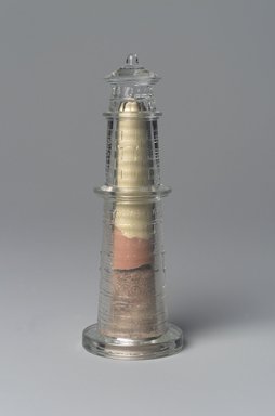 American. <em>Paperweight, Gay Head Lighthouse</em>, late 19th century. Glass, colored sand, 5 7/8 x 2 x 2 in. (14.9 x 5.1 x 5.1 cm). Brooklyn Museum, Gift of Mrs. William Greig Walker by subscription, 40.250. Creative Commons-BY (Photo: Brooklyn Museum, 40.250.jpg)